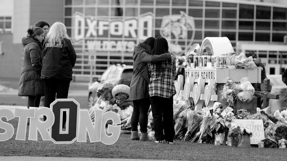 Victims, dad and mom of Oxford faculty taking pictures victims sue school employees